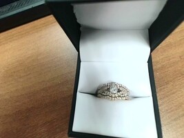  14kt Diam Engage ring about  1Ct total in diamonds 2 tone rose gold/ white gold