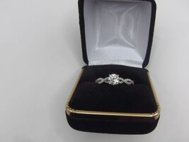 14kt White Gold .75 Center Lab Diamond Twist Band with Diamonds.  Only 999.99!!!
