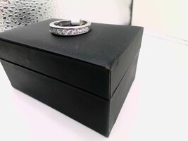  14kt White Gold Band With 10 beautiful diamonds.  This ring really sparkles!!!
