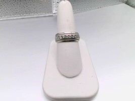 14kt White gold Band with 8 diamonds.  Sale Price 999.00!!!