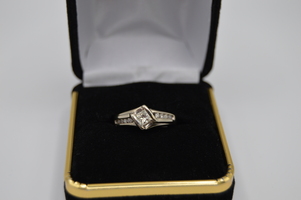  White gold 14kt Eng ring .40 Princess cut center 