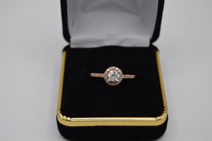  14kt Rose Gold 1/2 carat center Diamond Ring.  $1999.99